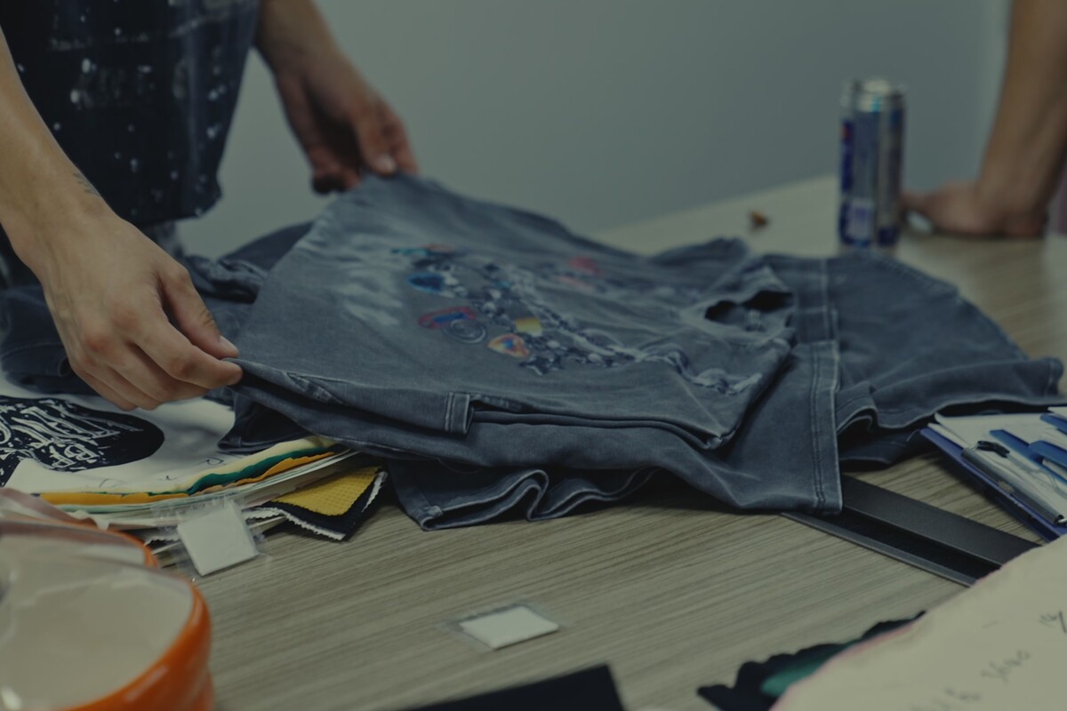Decorated sample checked against colour swatches and labels before production