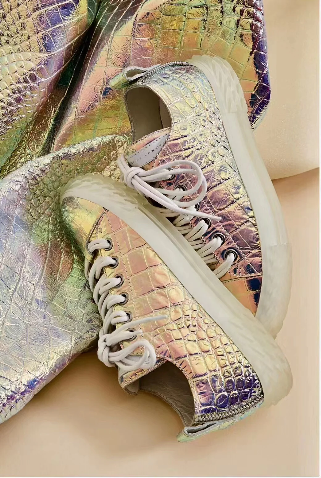 Footwear sample made with holographic embossed leather