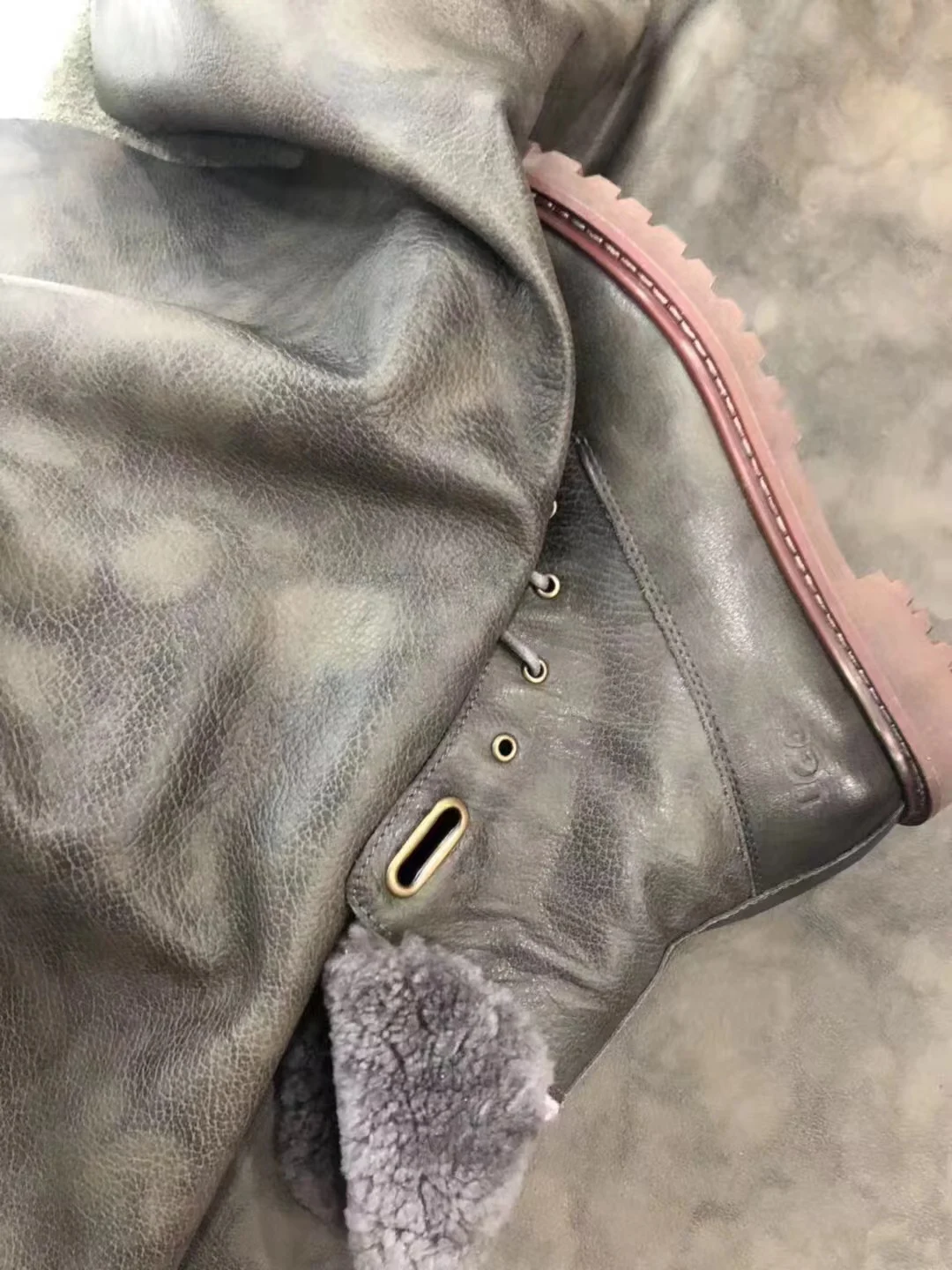 Boot material detail on a leather surface